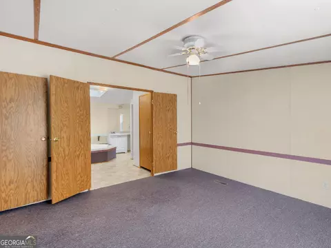 Bedroom - 245 Brooks Rd, Jackson, GA 30233 photo 9 of 11