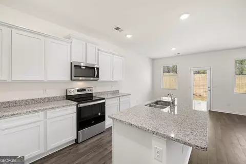 Kitchen - 11924 Aukerman Way, Hampton, GA 30228 photo 2 of 2