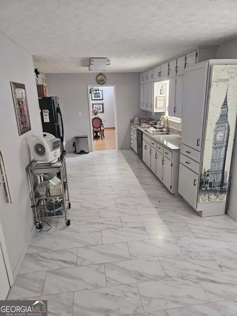 Kitchen - 215 Carl Parker Rd, Hampton, GA 30228 photo 1 of 2