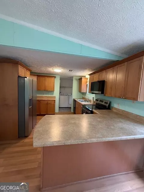 Kitchen - 2791 Old Mill Rd, Rutledge, GA 30663 photo 3 of 5