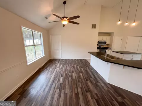 Living - 169 Manley Dr, Hampton, GA 30228 photo 2 of 3