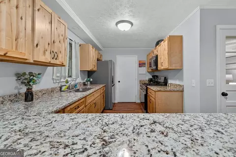 Kitchen - 199 Cherry St SE, Calhoun, GA 30701 photo 4 of 5