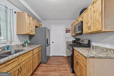 Kitchen - 199 Cherry St SE, Calhoun, GA 30701 photo 3 of 5