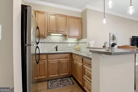 Kitchen - 235 Ashmere Ct, Tyrone, GA 30290 photo 8 of 8