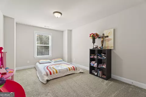 Bedroom - 656 E Lake Rd, Mcdonough, GA 30252 photo 5 of 9