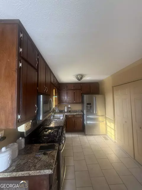 Kitchen - 245 W James Cir, Hampton, GA 30228 photo 1 of 2