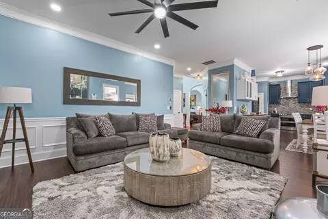 Living - 132 Luke Cv, Hampton, GA 30228 photo 4 of 5