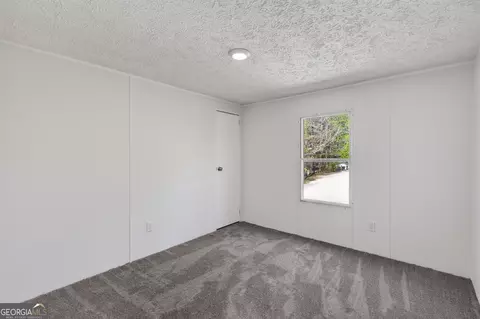 Bedroom - 886 Walnut Dr, Monroe, GA 30655 photo 6 of 7