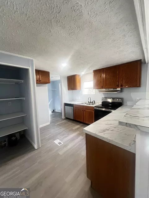 Kitchen - 886 Walnut Dr, Monroe, GA 30655 photo 2 of 2