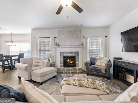 Living - 558 Calgary Downs Dr, Winder, GA 30680 photo 2 of 2