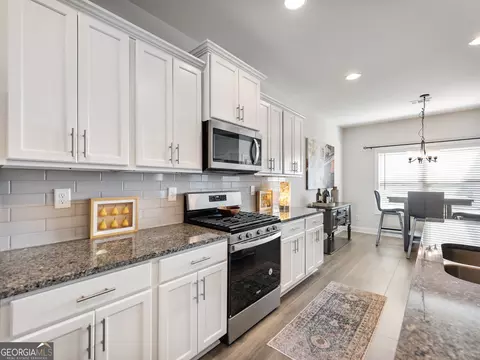 Kitchen - 558 Calgary Downs Dr, Winder, GA 30680 photo 3 of 4