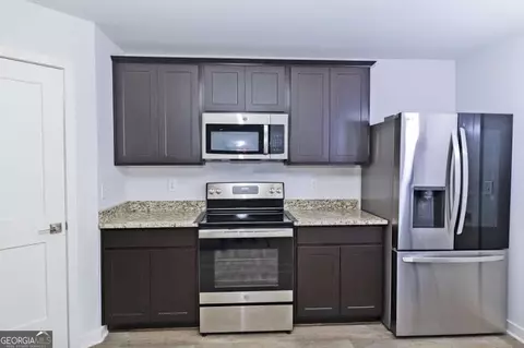 Kitchen - 244 Overlook Rd, Covington, GA 30014 photo 2 of 2