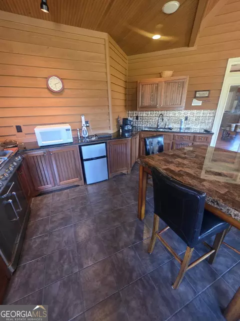 Kitchen - 1202 Red Oak Dr, Monroe, GA 30655 photo 19 of 19