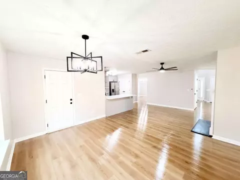 Living - 227 Millstone Dr, Hampton, GA 30228 photo 3 of 4