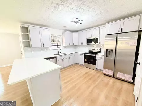 Kitchen - 227 Millstone Dr, Hampton, GA 30228 photo 2 of 3