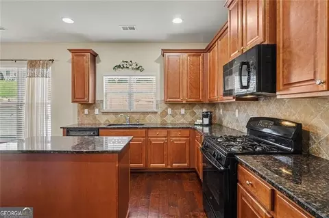 Kitchen - 12155 Centerra Dr, Hampton, GA 30228 photo 1 of 2