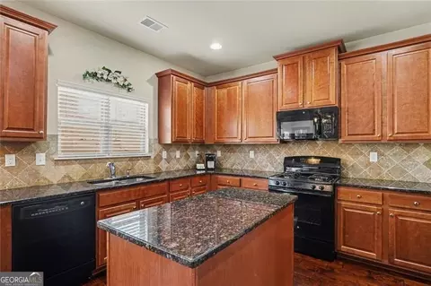Kitchen - 12155 Centerra Dr, Hampton, GA 30228 photo 2 of 2