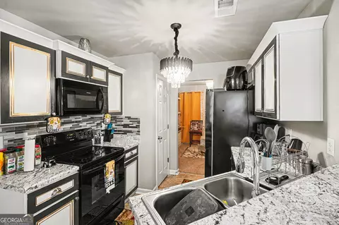 Kitchen - 308 Pardue Dr, Thomaston, GA 30286 photo 1 of 3