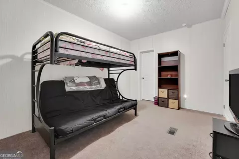 Bedroom - 90 Forest Rd, Stockbridge, GA 30281 photo 6 of 7