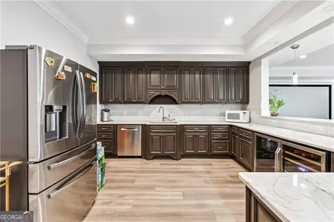 Kitchen - 8760 Colonial Pl, Duluth, GA 30097 photo 7 of 8