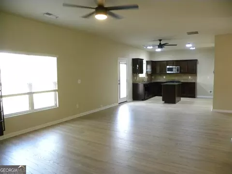 Living - 2466 Foxy Dr, Bethlehem, GA 30620 photo 5 of 8