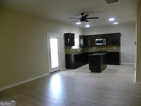 Living - 2466 Foxy Dr, Bethlehem, GA 30620 photo 4 of 8