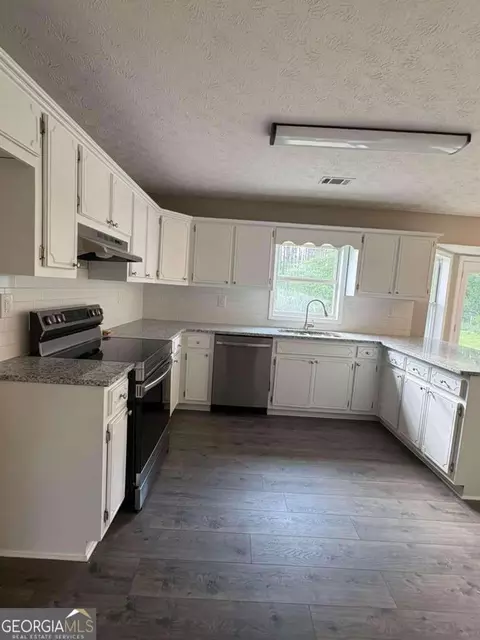 Kitchen - 55 Boardwalk Ave, Covington, GA 30016 photo 4 of 4