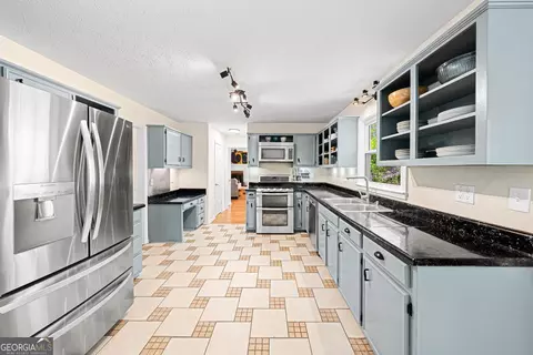 Kitchen - 761 Winnbrook Dr, Dacula, GA 30019 photo 2 of 3