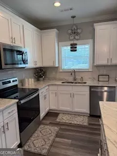 Kitchen - 1036 Field St, Dudley, GA 31022 photo 2 of 2
