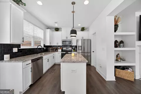 Kitchen - 7691 Feast Rd, Fairburn, GA 30213 photo 2 of 3