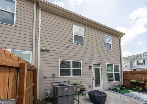 Exterior - 7691 Feast Rd, Fairburn, GA 30213 photo 6 of 7