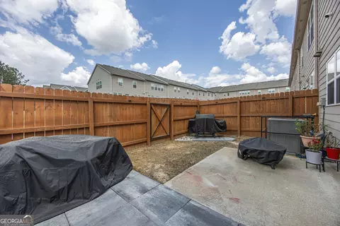 Exterior - 7691 Feast Rd, Fairburn, GA 30213 photo 4 of 7