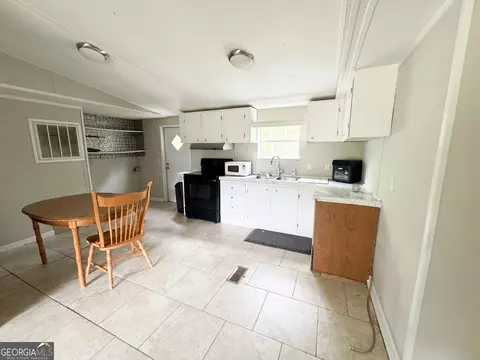 Kitchen - 877 W Rushing Rd, Register, GA 30452 photo 1 of 2