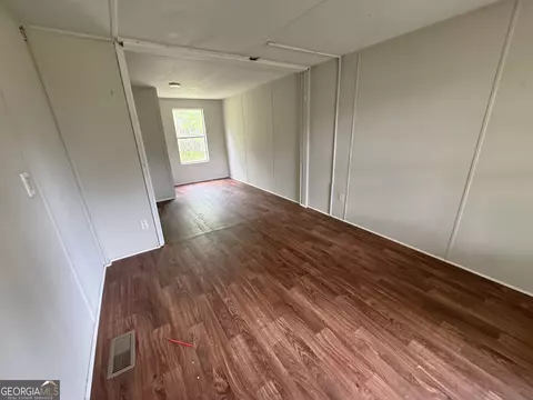 Living - 877 W Rushing Rd, Register, GA 30452 photo 3 of 5