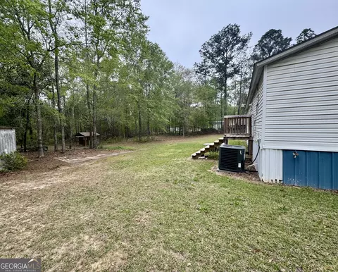 Exterior - 877 W Rushing Rd, Register, GA 30452 photo 5 of 7
