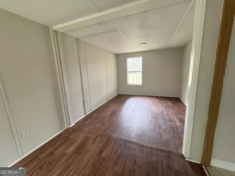 Living - 877 W Rushing Rd, Register, GA 30452 photo 4 of 5