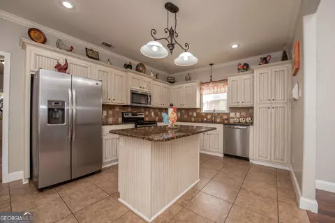 Kitchen - 301 Old Windmill Rd, Perry, GA 31069 photo 1 of 4