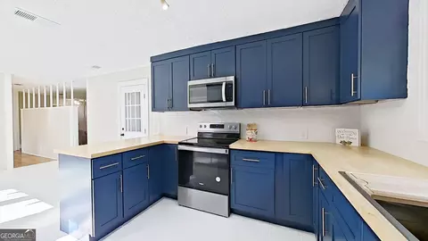 Kitchen - 481 4th St, Cairo, GA 39828 photo 3 of 7