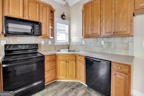 Kitchen - 205 Ryan Ln, Covington, GA 30014 photo 2 of 3