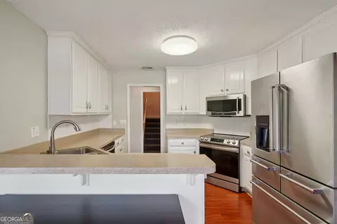 Kitchen - 128 Moss Pointe Dr, Mcdonough, GA 30253 photo 2 of 4
