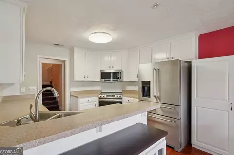 Kitchen - 128 Moss Pointe Dr, Mcdonough, GA 30253 photo 3 of 4