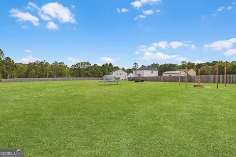 Exterior - 231 Caroline Way, Guyton, GA 31312 photo 4 of 10