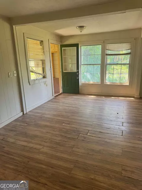Living - 165 Cherokee Ave, Ball Ground, GA 30107 photo 3 of 4