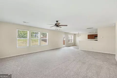 Living - 1160 Pebble Ridge Dr, Hampton, GA 30228 photo 4 of 7