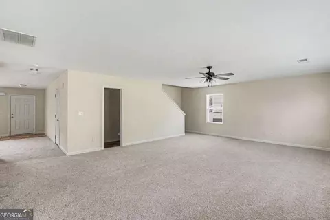 Living - 1160 Pebble Ridge Dr, Hampton, GA 30228 photo 3 of 7