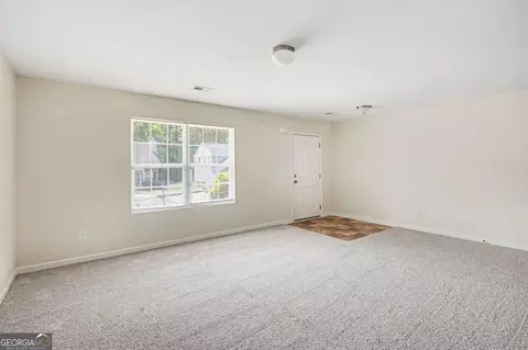 Living - 1160 Pebble Ridge Dr, Hampton, GA 30228 photo 6 of 7