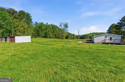 Exterior - 235 Kirk Rd NW, White, GA 30184 photo 3 of 7