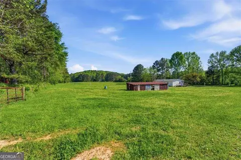 Exterior - 235 Kirk Rd NW, White, GA 30184 photo 4 of 7