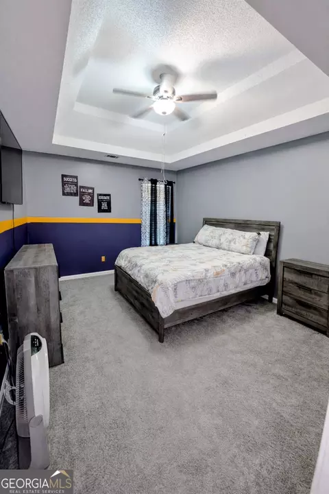 Bedroom - 405 Browning Field Way, Hampton, GA 30228 photo 7 of 9