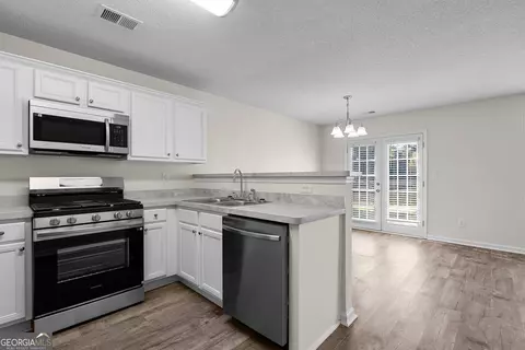 Kitchen - 230 Crestfield Cir, Covington, GA 30016 photo 2 of 2